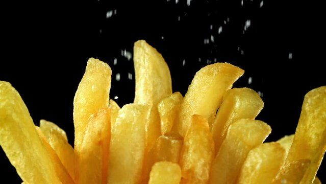 Super slow motion french fries. High quality FullHD footage