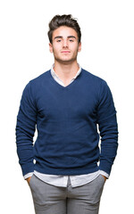Obraz premium Young handsome business man over isolated background with serious expression on face. Simple and natural looking at the camera.
