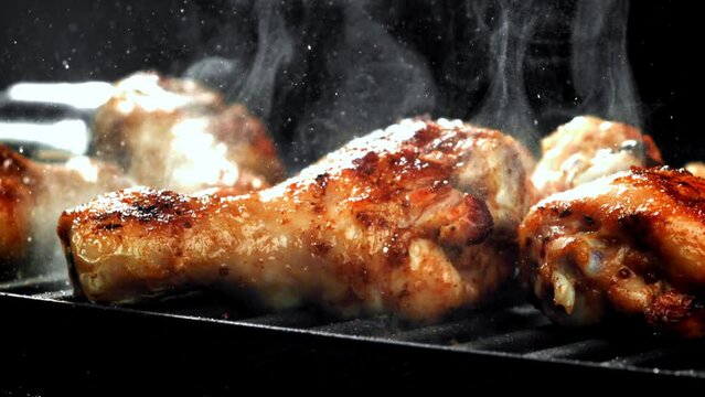 Super slow motion Chicken legs are fried in a pan. High quality FullHD footage