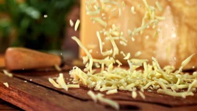 Super slow motion shredded cheese. High quality FullHD footage