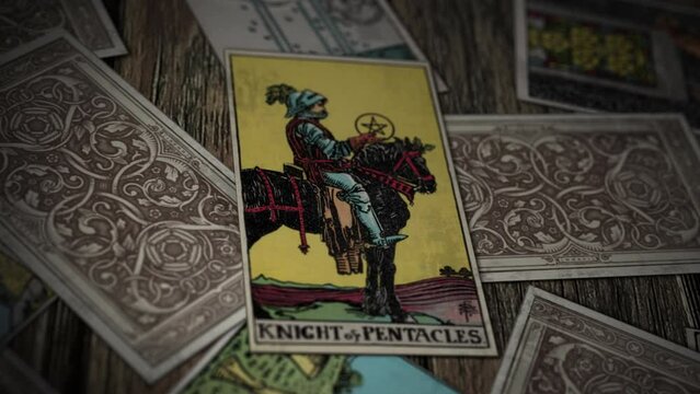 Paris, France - April 15, 2022. Forecasting the destiny using the magic vintage tarot cards. Forecasting the fate using magic vintage occult symbols. Forecasting the future with magic vintage cards