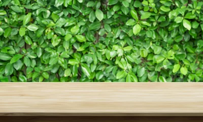 Selbstklebende Fototapeten horizontal table with leaves behind © oliv-walk