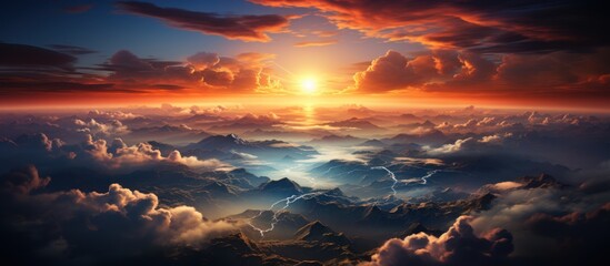 Aerial view of beautiful sunset above the clouds. - obrazy, fototapety, plakaty