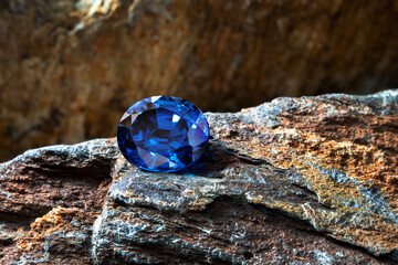 blue sapphire on stone background, close up shot