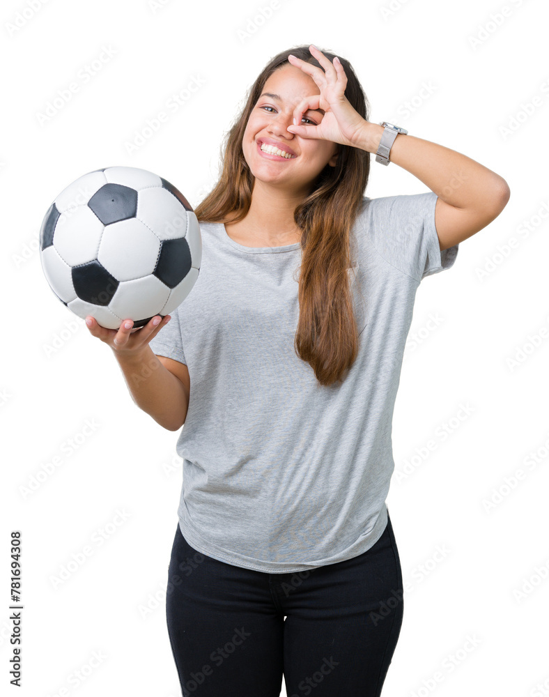 Sticker young beautiful brunette woman holding soccer football ball over isolated background with happy face