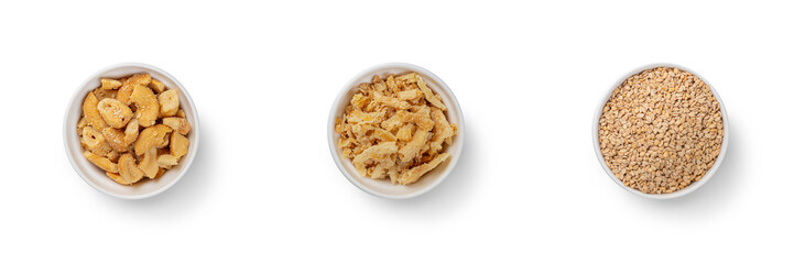 Overhead view of Ramekin of Crispy Onions crushed cashew and sesame seeds - 781707114