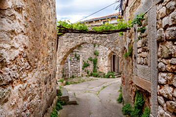 Typical old town scene in the medieval village of Plomin, Croatia
