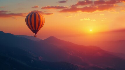 Hot air balloon above high mountain at sunset, filtered background - obrazy, fototapety, plakaty