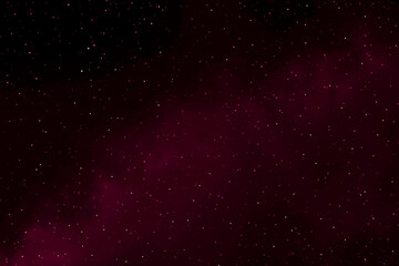 Red magenta purple starry night sky. Galaxy space background. Concept of Christmas, New Year and Celebration backgrounds.