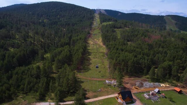 Zlatibor Mountain Resort, Serbia. Aerial View of Gondola Lift Above Green ;Landscape Under Tornik Peak