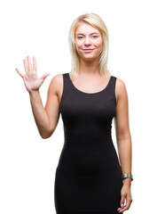 Young beautiful blonde attractive woman wearing elegant dress over isolated background showing and pointing up with fingers number five while smiling confident and happy.