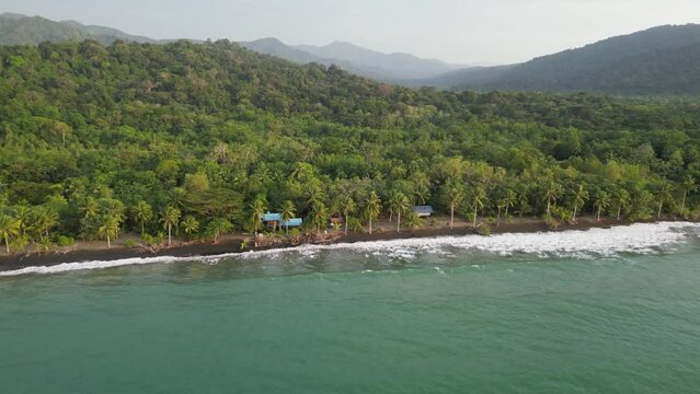 Aerial view of remote Playa Mecana beach and the lush jungle near Bah&iacute;a Solano in the Choc&oacute; department on the Pacific Coast of Colombia