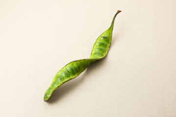 Pete or Petai or stink bean, usually eaten raw or for other cooking ingredients.

