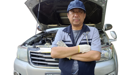 mechanic changing car engine