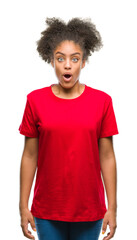 Young afro american woman over isolated background afraid and shocked with surprise expression,...