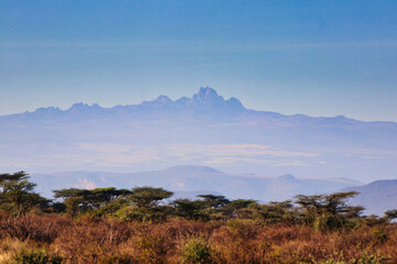 Mount Kenya, thehighest mountain in Kenya at 5199 meters dominates the horizon as seen over the...