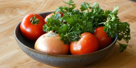 Close up of a bowl full of fresh vegetables, tomatoes, parsley, and onions.