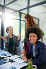 Happy, portrait and African woman in office for web design, startup company and data analysis. International team, laptop and brainstorm in workplace for project, development and global partnership