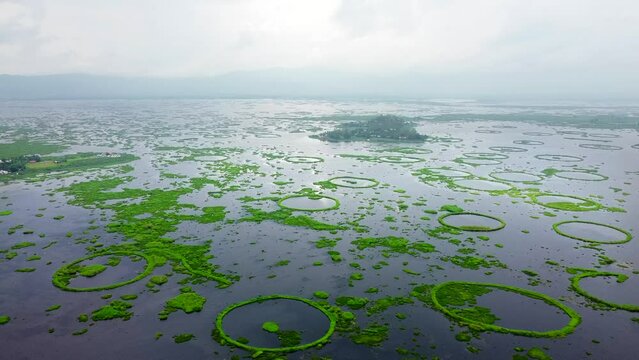 Aerial view loktak lake is the largest freshwater lake and thanga village in India as well as the largest lake in manipur north east India.