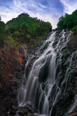 Fototapeta na wymiar Espigantosa waterfall. Long exposure. Vertical. Eriste. Benasque Valley. Pirineo. Pirineo aragonés. Aragón. Spain.