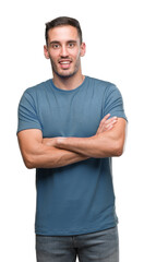 Handsome young casual man happy face smiling with crossed arms looking at the camera. Positive person.