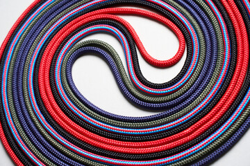 Colorful rope twisted on a white background - 781812593