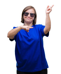 Young adult woman with down syndrome wearing sunglasses over isolated background smiling and...