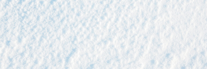 Natural snow texture. The surface of an icy snow crust. Snowy ground. Wide panoramic winter background with snow patterns. Perfect for Christmas and New Year design. Closeup top view. - 781818142