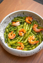 Penne pasta with shrimp and pesto sauce