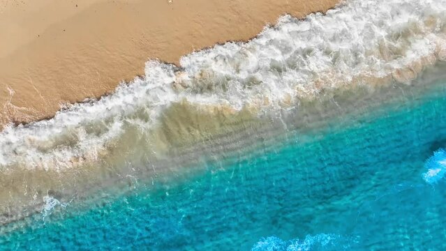 background for summer vacation concept. Nature of the beach and sea, summer with sunlight, sandy beach The sparkling sea water contrasts with the blue sky	