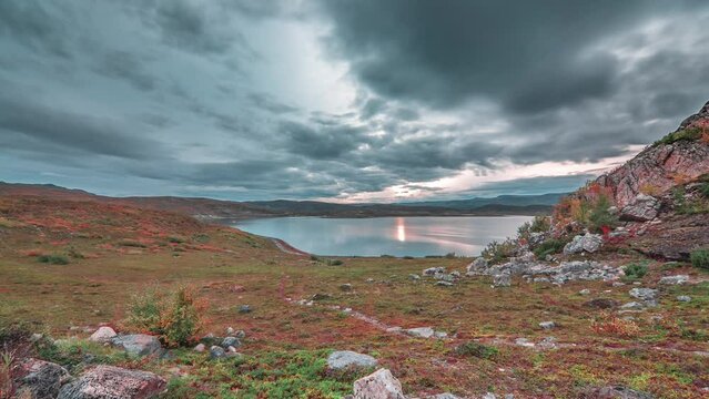 A stark landscape of autumn tundra on the shores of the Norwegian fjord.