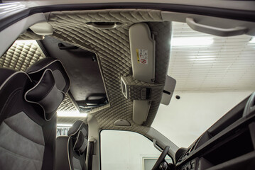 Comfortable interior of a passenger bus with soft seats
