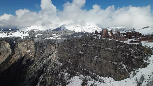 Epic view of the French Alps with ski village of Avoriaz, 4K drone shot