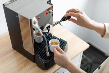 Cooking coffee at home with home coffee machine - 781851514