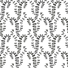 Monochrome seamless pattern with black wild flowers silhouettes on white background. Vintage ditsy floral repeat pattern.