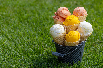 Assorted ice cream flavours in delightful waffle cones