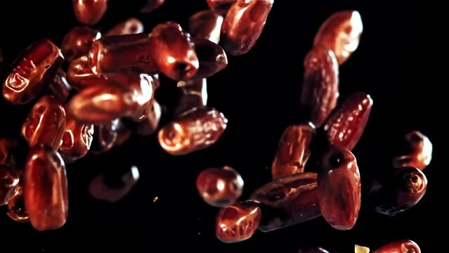 A visually captivating video showcases dates falling in slow motion on a black background, symbolizing the concept of time and deadlines with a touch of creativity