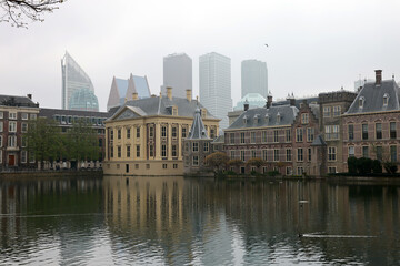 The Mauritshuis museum building and Binnenhof - Dutch Parliament with Hofvijver pond, The Hague, The Netherlands;