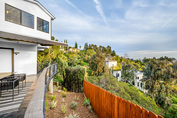 Modern Hollywood Hills home balcony in Los Angeles, California, with a remodel of an older house