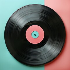 A black vinyl record on a blue and pink background.