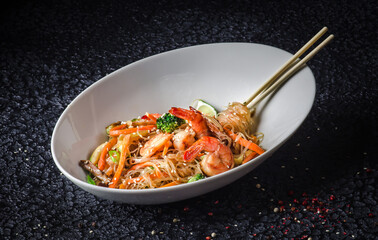 In the image you can see an Asian dish, Thai seafood salad 