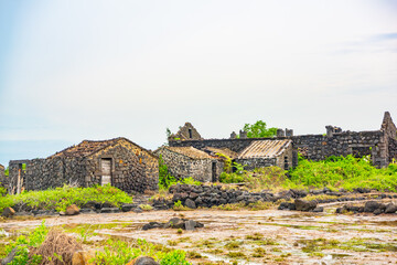 Fototapeta na wymiar Stone houses and stone piles in the ancient salt fields of Yanding, Danzhou, Hainan, China