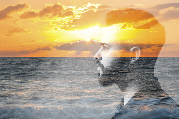 Double exposure of handsome man and sea at sunset