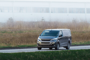 Fototapeta premium The Daily Route of a Commercial Delivery Van, Bringing Orders to Life