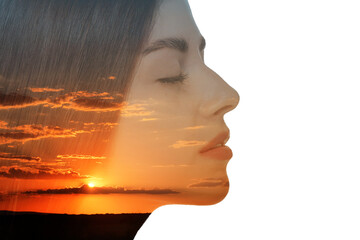 Double exposure of beautiful woman and cloudy sky at sunset