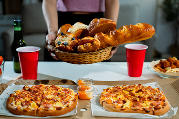 drinks and conversation, social gathering and get together. Young people, group and happiness at fast food pizzeria, celebration at home.