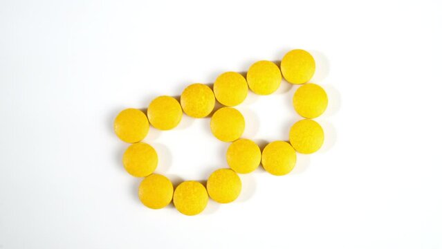 Vitamin B Pills on white Background