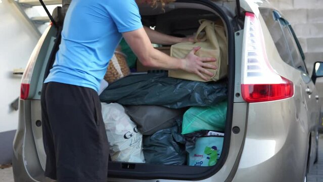 loading the car with things