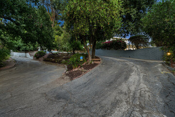 Remodeled Los Angeles home with a vacant concrete driveway