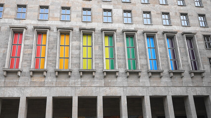Colorful bi symbol hang finance ministry window. Vivid rainbow flag. Lgbt decoration design. Gay...